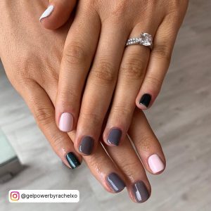 Grey, Black, Pink, And White Summer Nails Over Wooden Surface
