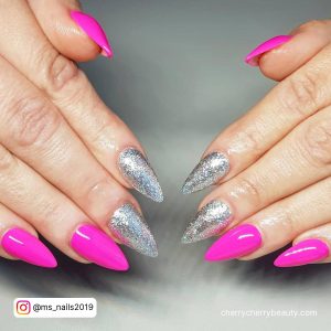 Hot Pink And Silver Acrylic Nails In Stilleto Shape