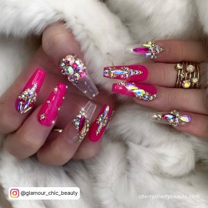 Hot Pink Long Coffin Nails With Colorful Rhinestones And Clear Nails