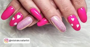 Hot Pink Nails Valentines With One Light Pink Nail And White Heart Design