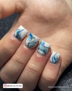 Light Blue And Silver Nail Designs On White Base Coat