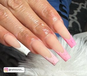 Light Pink French Tip Valentines Day Nails In Pink Gradients With Hearts On The Tips