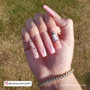 Light Pink Nails Acrylic With Black And White Ghost Design