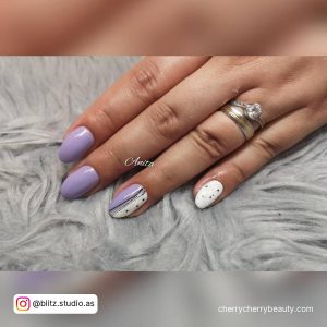 Light Purple Nails With White Design