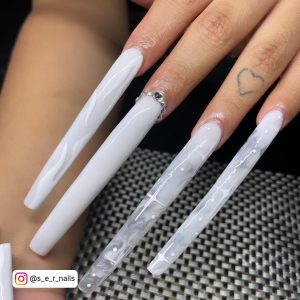 Long Milky White Nails With Diamonds