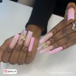 Long Pink Acrylic Nails With Embellishments