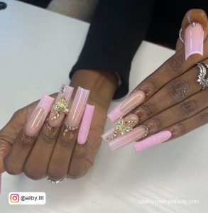 Long Pink Acrylic Nails With Embellishments