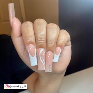 Long Pink And White Nails With Marble Design On One Finger