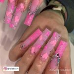 Long Pink Valentine Nail Designs With Glitter, Rhinestones, And Heart Designs