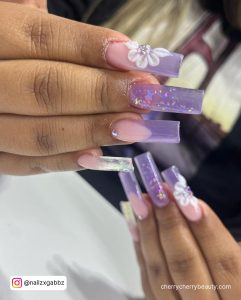Long Purple Acrylic Nails With Flowers