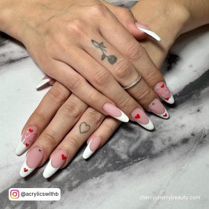Long Round Tip French Tip Nails With Simple Red Heart Designs