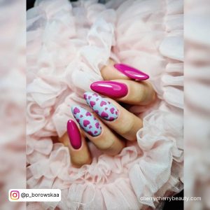 Long Round Tip White And Pink Valentine'S Day Nail Ideas With Two White Nails With Pink Heart Designs