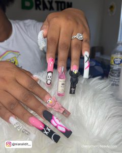 Long Square Tip Pink And Black Baddie Nails With Punk Rock Designs And A 3D Pink And Black Monster