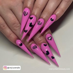 Long Stiletto Pink And Black Valentine Nails With Hot Pink Nails With Black Hearts