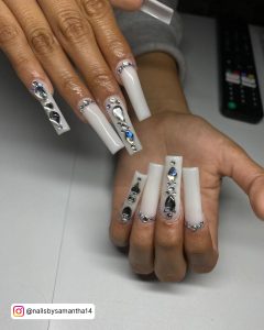 Long White Coffin Nails With Diamonds For A Fancy Look