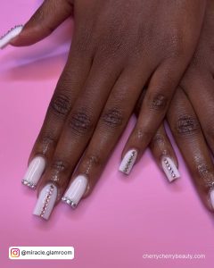 Long White Coffin Nails With Rhinestones On The Tips