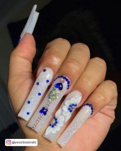 Long White Nails With Diamonds In Blue Color