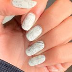 Matte White Acrylic Nails With Creative Design