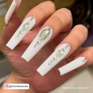 Matte White Nails With Rhinestones On All Fingers