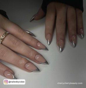 Metallic Silver French Tip Nails In Stilleto Shape