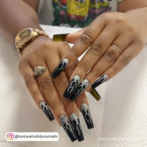 Nail Art With Silver And Black Combination