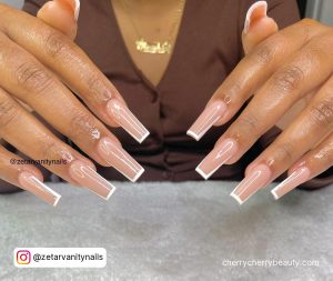 Nails Outlined In White In Long Square Shape
