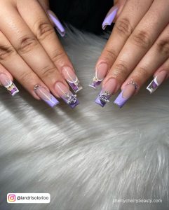 Nails With White Outline In Purple Color
