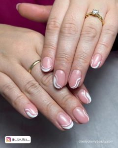 Nails With White Swirls And Rings