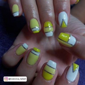 Nails Yellow And White With Abstract Design