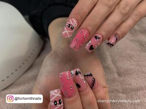 Natural Pink Acrylic Nails With Black Hearts
