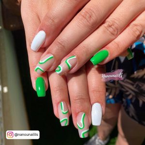 Neon Green And White Nails With Marble Design On Two Fingers