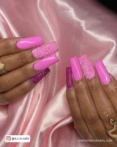 Neon Pink Acrylic Nails With Glitter