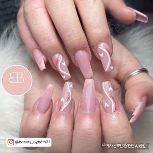 Nude Nails With White Swirls And Hearts