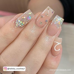 Nude Square Tip Nails With Silver Glitter Confetti, Silver Glitter Tips, Silver Glitter Polka Dots And 21 Written In Silver