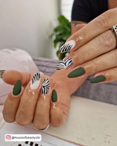 Olive Green And White Nails With Zebra Print On Two Fingers