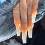 Orange And White Ombre Nails For A Fun Look
