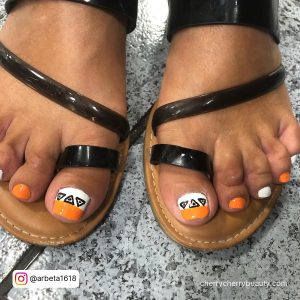 Orange And White Toe Nail Designs With Black Color