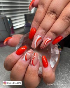 Orange White Swirl Nails In Neon