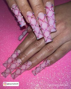 Pink Acrylic Powder Nails With A Check Pattern