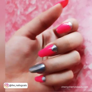 Pink And Silver Acrylic Nails With Chrome Finish On Ring Finger