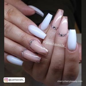 Pink And White Nails With Rhinestones Near The Nail Bed