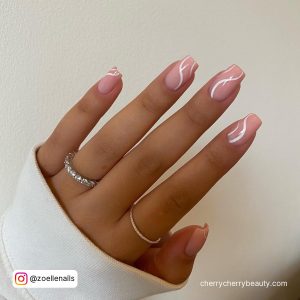 Pink And White Swirl Nails For A Marble Effect