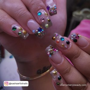 Pink Clear Acrylic Nails With Different Colored Rhinestones