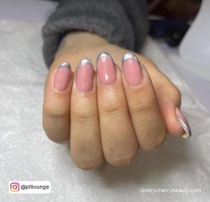 Pink Nails With Silver Glitter Tips And Pink Base Coat