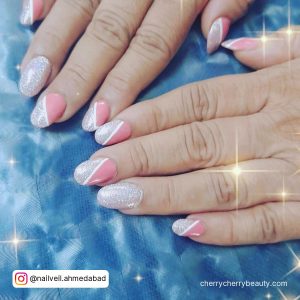 Pink Nails With Silver Glitter Tips And White Outline