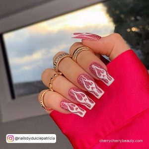 Pink Nails With White Flames In Front Of A Window