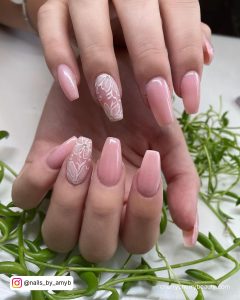 Pink Nails With White Flower Design With Plants