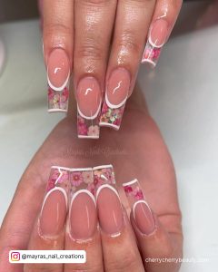 Pink Nails With White Outline And Flowers