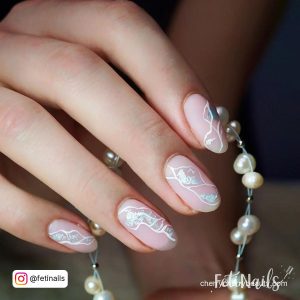 Pink White Silver Nails With Design On Each Finger