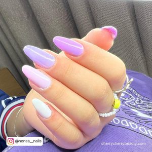 Purple And White Acrylic Nail Designs In Almond Shape